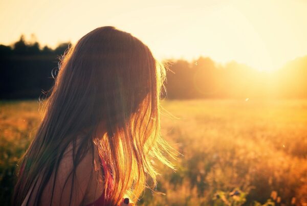 Person walking in a field