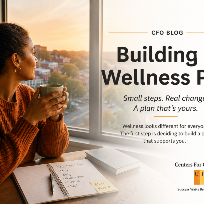 A person pausing with a warm drink by a window, beginning to build a wellness plan.
